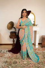 Turquoise Blue & Peach Khaddi Georgette Saree with Golden Woven Floral Border