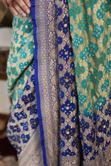 Royal Blue & Turquoise Khaddi Georgette Saree with Intricate Golden Woven Border