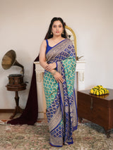 Royal Blue & Turquoise Khaddi Georgette Saree with Intricate Golden Woven Border